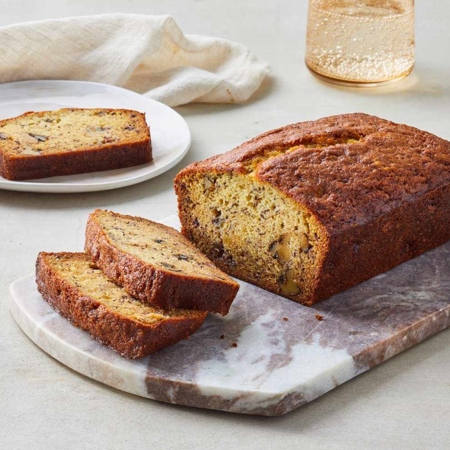 Banana bread with drink on table